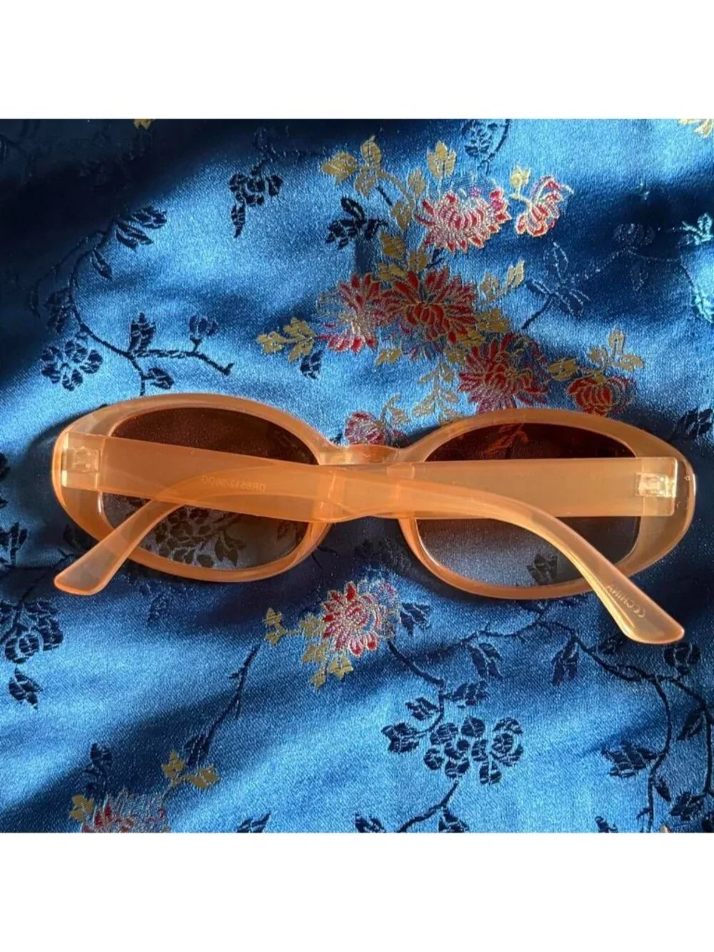 Orange Tinted Oval Sunglasses